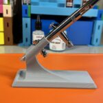 Side view of a 3D Printed Airbrush Stand holding an airbrush